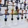 Assorted hookahs lined up on store shelf – Pipe King LLC Los Angeles Wholesale Smoke Shop