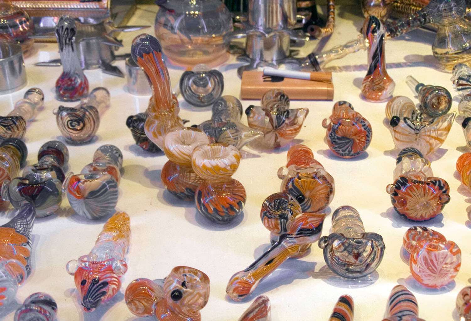 a group of glass pipes on a table