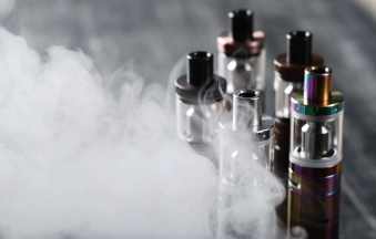 Vaping device on the wooden table